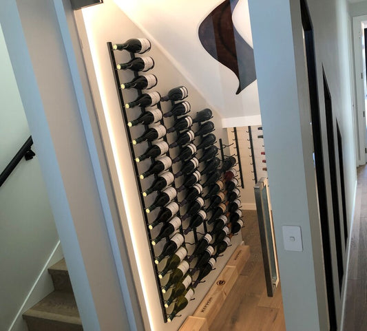 Wine cellar space under staircase