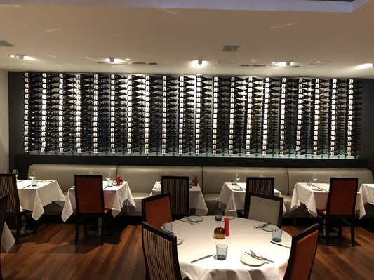 Pullman Hotel with wall of wine on display in restaurant