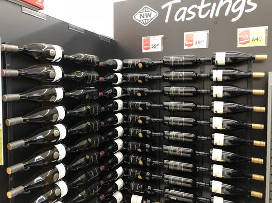 New World Blenheim wine display with bottles on the side, label forward