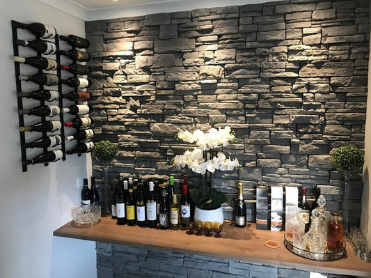 Metal wine racks wall mounted in room