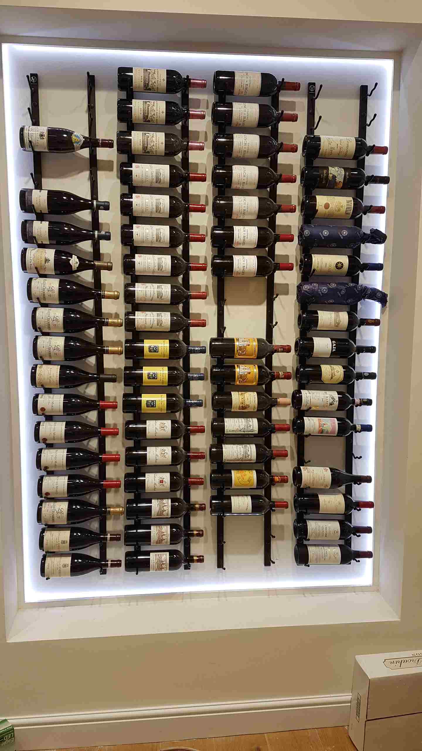9 bottle wine rack wall mounted in alcove wine cellar space